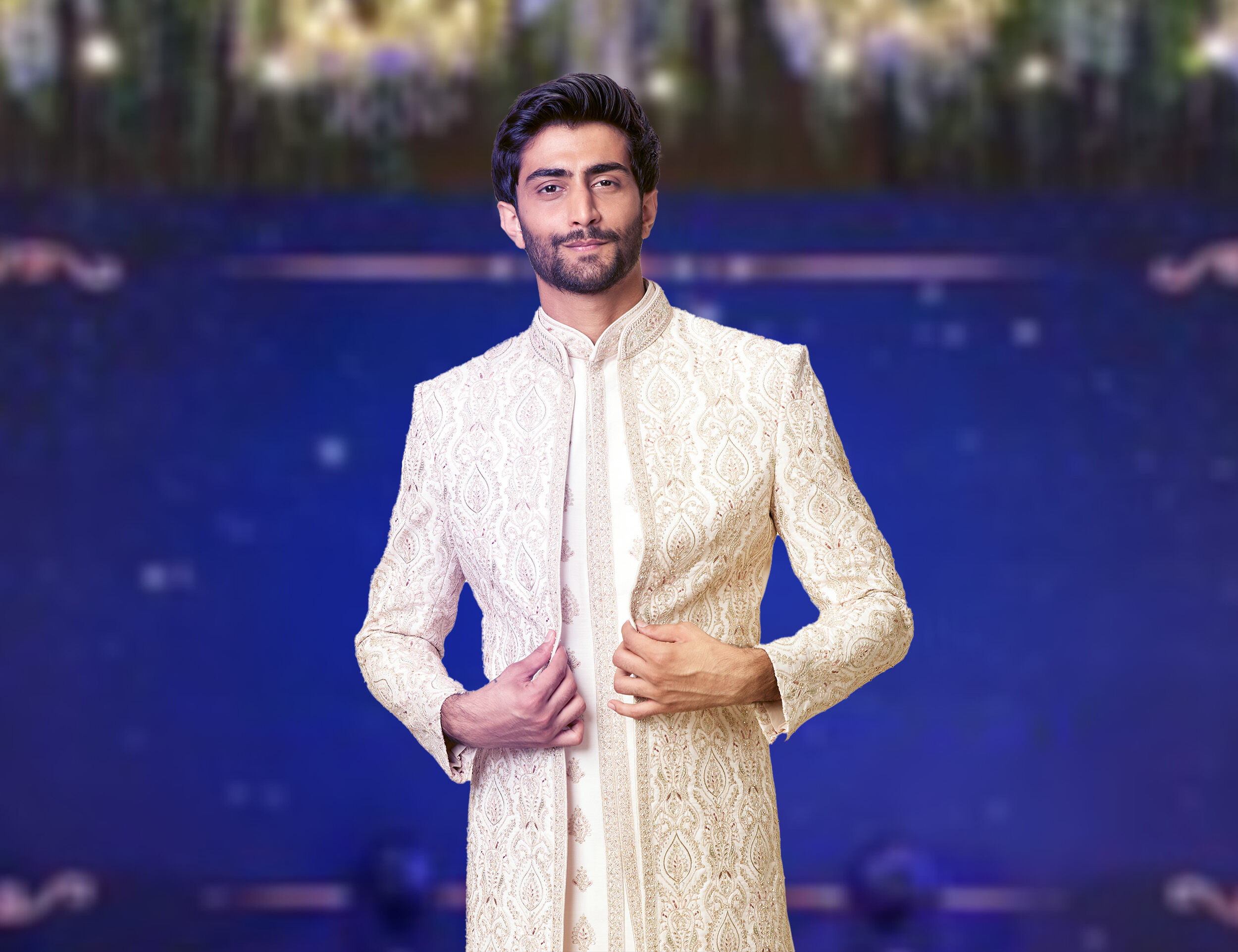 A man wearing sherwani with printed jacket for sangeet ceremony